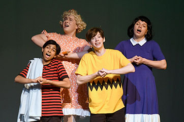 Students during a Charlie Brown performance. Link to Gifts by Estate Note